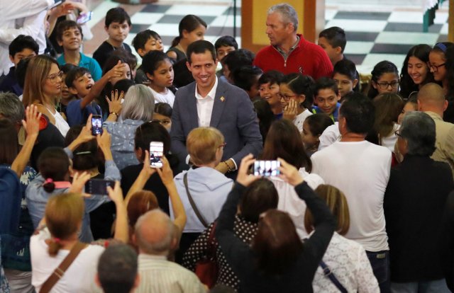Venezuela's Guaido takes part in religious event in Caracas