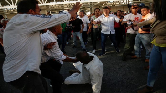 Venezuela's opposition leader Juan Guaido arrives at Simon Bolivar international airport in Maiquetia