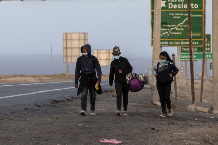 migrantes-venezolanos-696x464