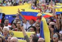 Protestors demonstrate against Venezuela’s President Nicolás Maduro’s government at Plaza Bolivar in Lima, Peru. Source: Guadalupe Pardo/Reuters.