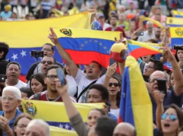 Protestors demonstrate against Venezuela’s President Nicolás Maduro’s government at Plaza Bolivar in Lima, Peru. Source: Guadalupe Pardo/Reuters.